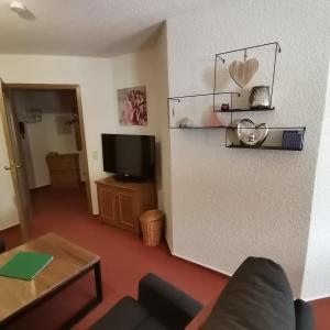 TV a/nebo společenská místnost v ubytování Ferienwohnungen Kupferkanne