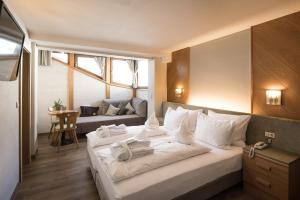 Katil atau katil-katil dalam bilik di Hotel Alpenjuwel