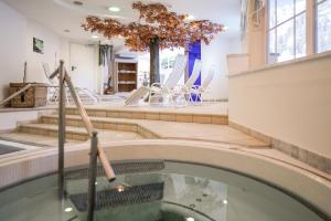 Koupelna v ubytování Hotel Alpenjuwel