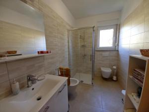 Koupelna v ubytování House Matteo, Valdenaga