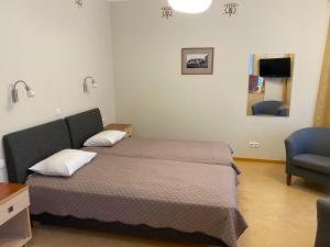 Postel nebo postele na pokoji v ubytování Hommiku Guesthouse + 37 fotografií
