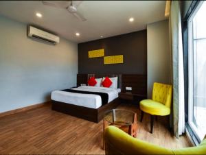 Voodi või voodid majutusasutuse Ka10 SQUARE HOTEL & BANQUETS toas