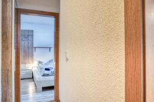 Postel nebo postele na pokoji v ubytování Haus Heimat & Appartement