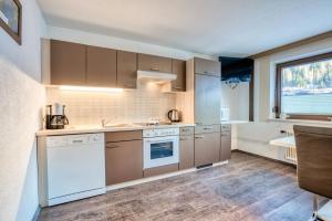 Kuchyň nebo kuchyňský kout v ubytování Haus Heimat & Appartement