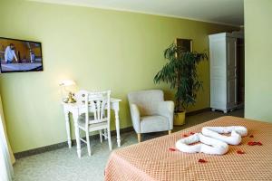 Postel nebo postele na pokoji v ubytování Hotel Metsis