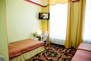 Postel nebo postele na pokoji v ubytování Hotel Metsis