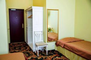 Postel nebo postele na pokoji v ubytování Hotel Metsis