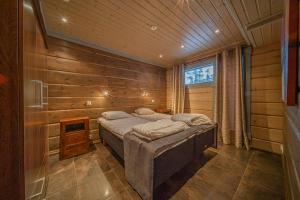 Un pat sau paturi într-o cameră la Levillas Kinnastie 35 Villas