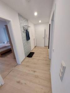 a hallway of a room with a hard wood floor at Ferienwohnung Helenenquelle in Bad Wildungen