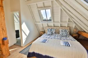 Un pat sau paturi într-o cameră la de Buwepleats