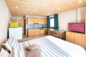 Μια τηλεόραση ή/και κέντρο ψυχαγωγίας στο Casa Martinelli Holiday Home