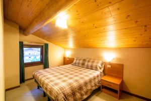 מיטה או מיטות בחדר ב-Casa Martinelli Holiday Home