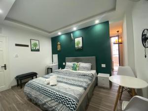 Ένα ή περισσότερα κρεβάτια σε δωμάτιο στο Lucas Inn