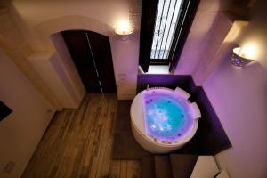 Фотография из галереи Le Suite Bed в городе Пульсано