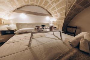 Кровать или кровати в номере Le Suite Bed