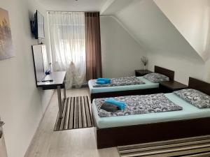 Postel nebo postele na pokoji v ubytování RIEDWIRTSHAUS