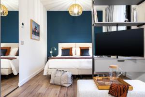 Katil atau katil-katil dalam bilik di CO99 Art Building Residence