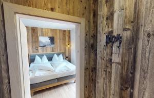 A bed or beds in a room at Appartement Hauser