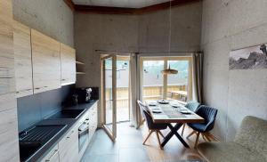 A kitchen or kitchenette at Appartement Hauser