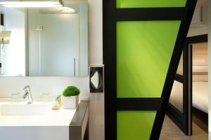 Koupelna v ubytování Hotel Le Colombier Suites