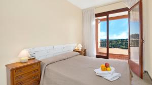 Posteľ alebo postele v izbe v ubytovaní 2Maer - Blanes