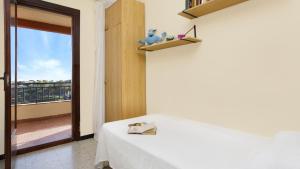 Posteľ alebo postele v izbe v ubytovaní 2Maer - Blanes