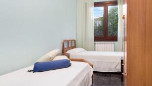 Posteľ alebo postele v izbe v ubytovaní 2Maer - Blanes