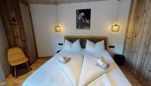 A bed or beds in a room at Appartement Hauser