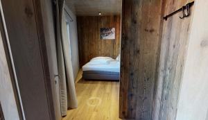 A bed or beds in a room at Appartement Hauser
