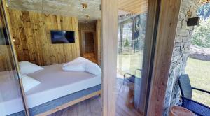 A bed or beds in a room at Appartement Hauser