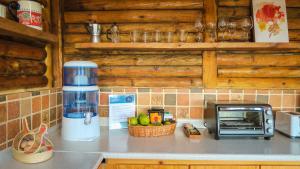 Kuchyň nebo kuchyňský kout v ubytování Nanatu Spacious peaceful cabin in Parque Arvi + 17 fotografií