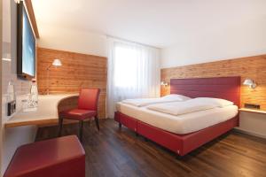 Postel nebo postele na pokoji v ubytování Parkhotel Schillerhöhe