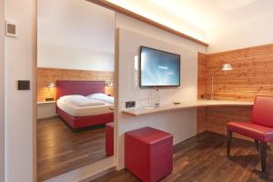 Postel nebo postele na pokoji v ubytování Parkhotel Schillerhöhe