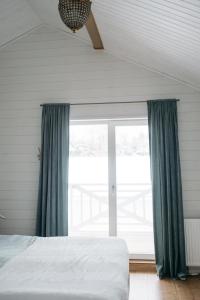 Letto o letti in una camera di Cosy beach house in West-Estonia