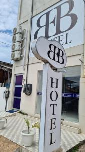 a sign in front of a building with a be sign at BeB Hotel in Macapá