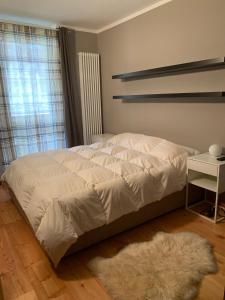 Llit o llits en una habitació de Casa Monique - Borgo Le Stalle Lunghe