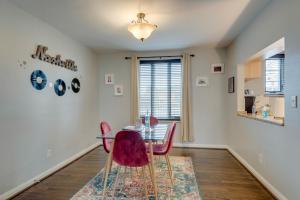 a dining room with a table and four chairs at Nashville Flat Close to Downtown 101 in Nashville