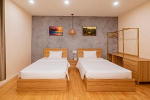 Postel nebo postele na pokoji v ubytování Maya Hotel 3