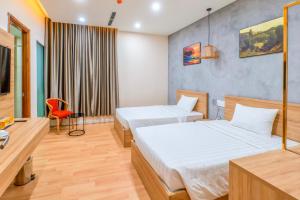 Postel nebo postele na pokoji v ubytování Maya Hotel 3