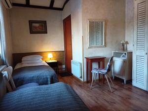 Postel nebo postele na pokoji v ubytování Avalon Rooms