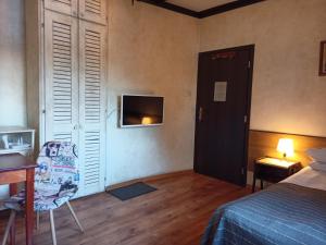 Postel nebo postele na pokoji v ubytování Avalon Rooms