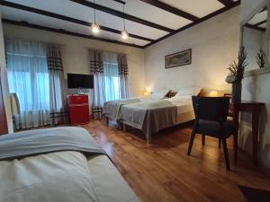 Postel nebo postele na pokoji v ubytování Avalon Rooms