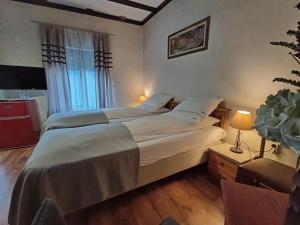Postel nebo postele na pokoji v ubytování Avalon Rooms