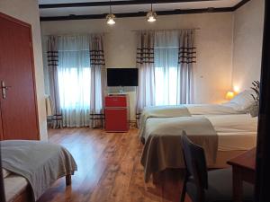 Postel nebo postele na pokoji v ubytování Avalon Rooms