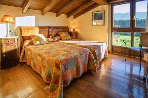 En eller flere senge i et værelse på Apartamentos Turísticos Las Nieves + 84 billeder