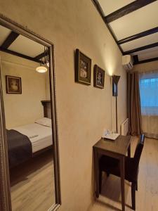 Postel nebo postele na pokoji v ubytování Avalon Rooms
