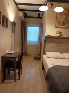 Postel nebo postele na pokoji v ubytování Avalon Rooms