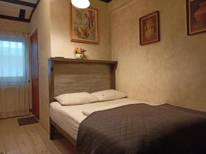 Postel nebo postele na pokoji v ubytování Avalon Rooms