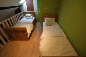 Postel nebo postele na pokoji v ubytování B&B Des4seigneurs