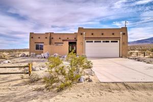 a building in the desert with a garage at Borrego Springs Stargazing Home with Mtn Views in Borrego Springs